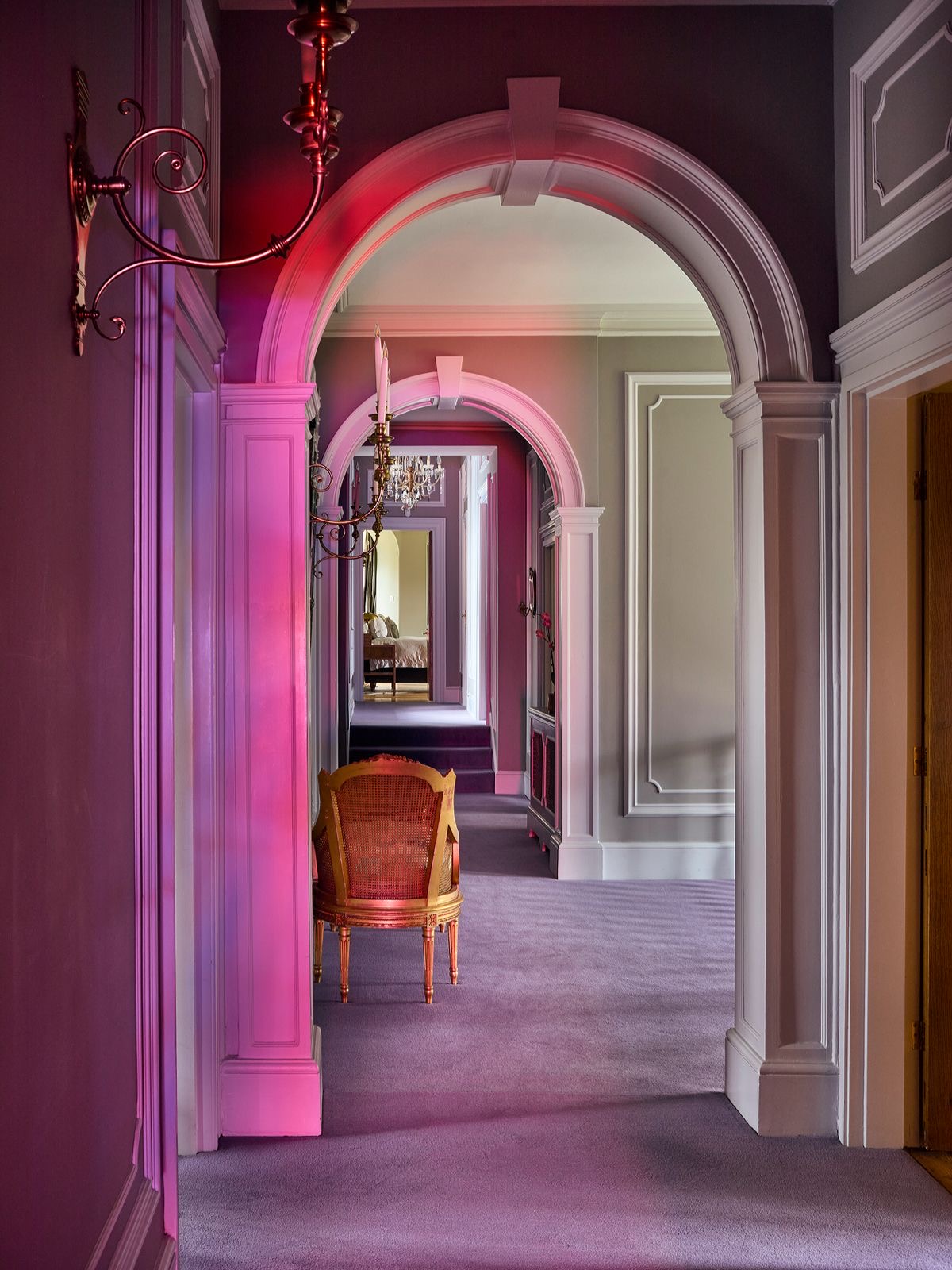 A run of arches along the upper landing